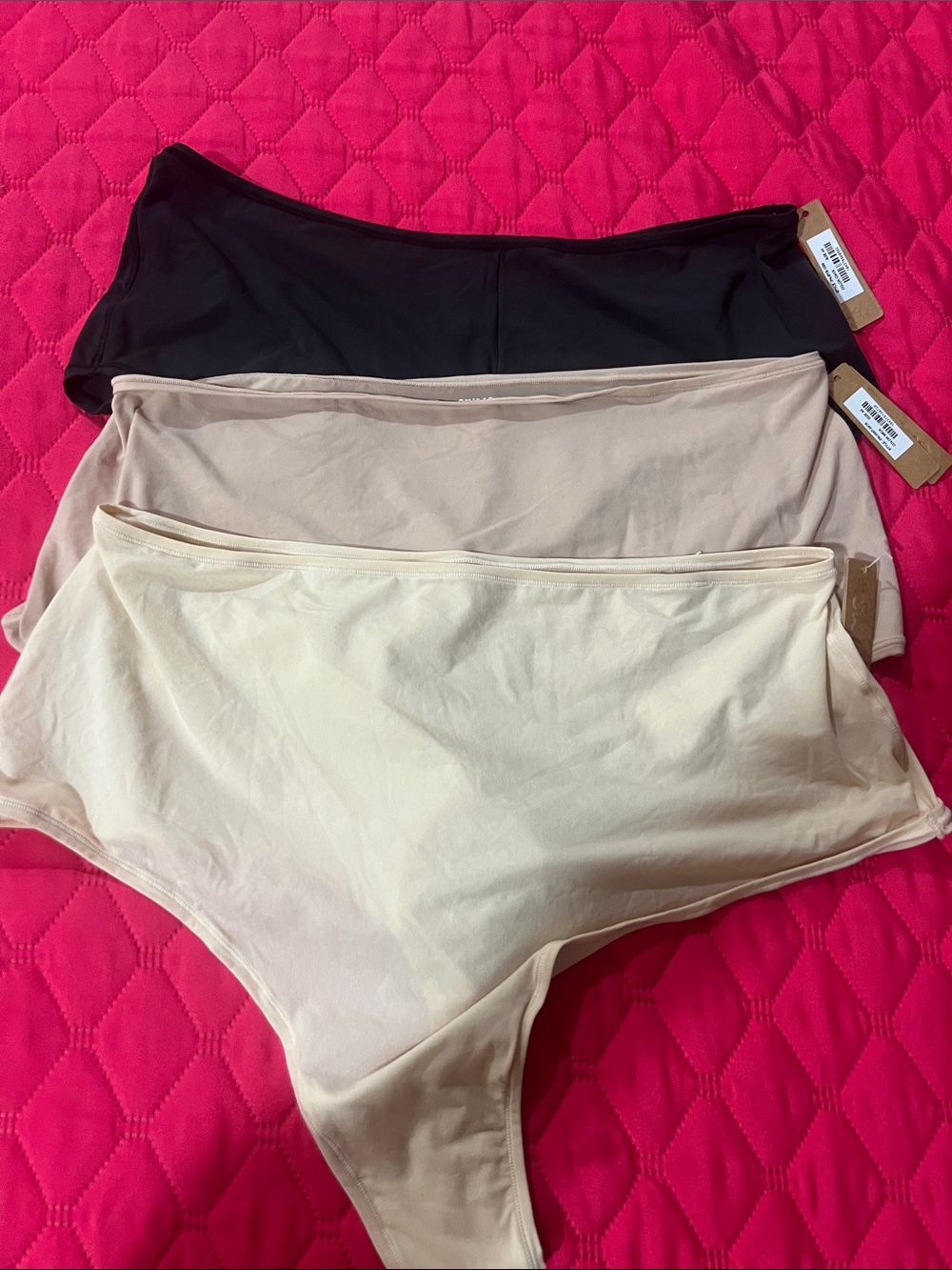SKIMS High-Waist Seamless Briefs in Black, Nude, Cream
